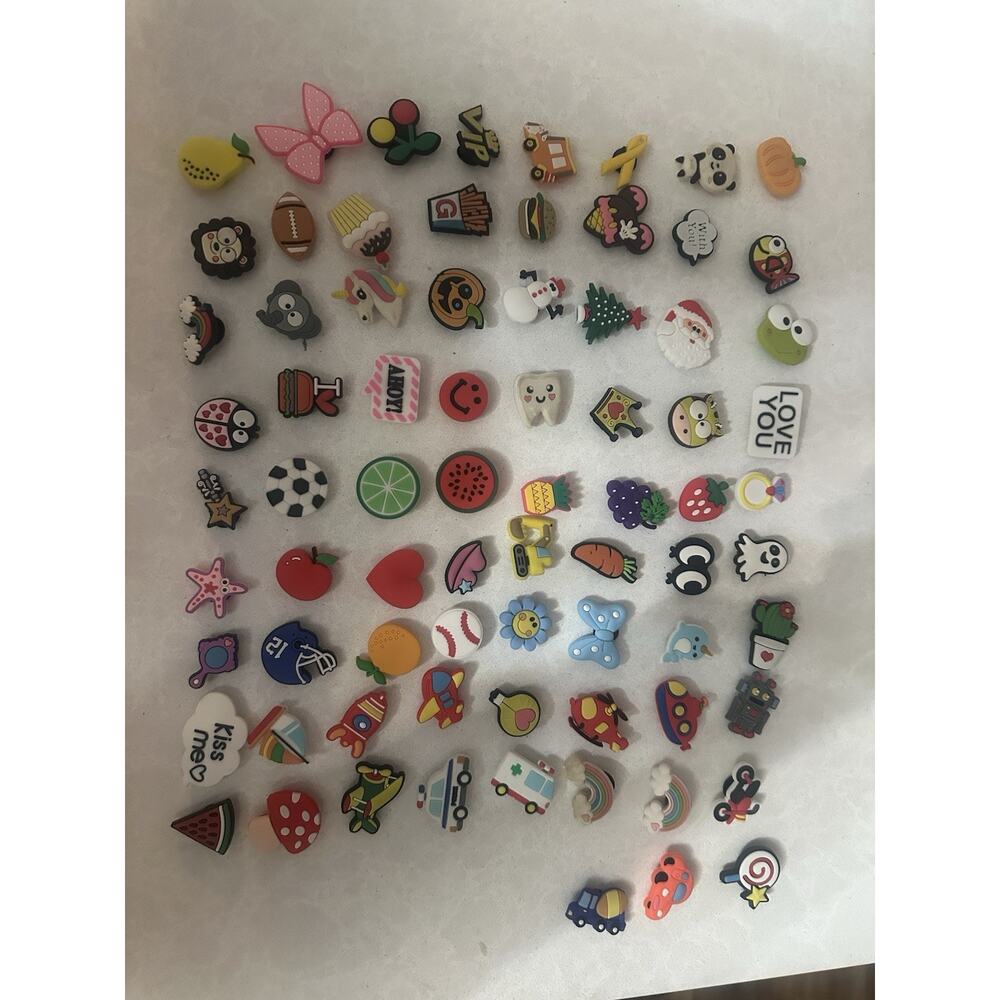 75 shoe charms assorted sports holiday princess animals vechiles food some new